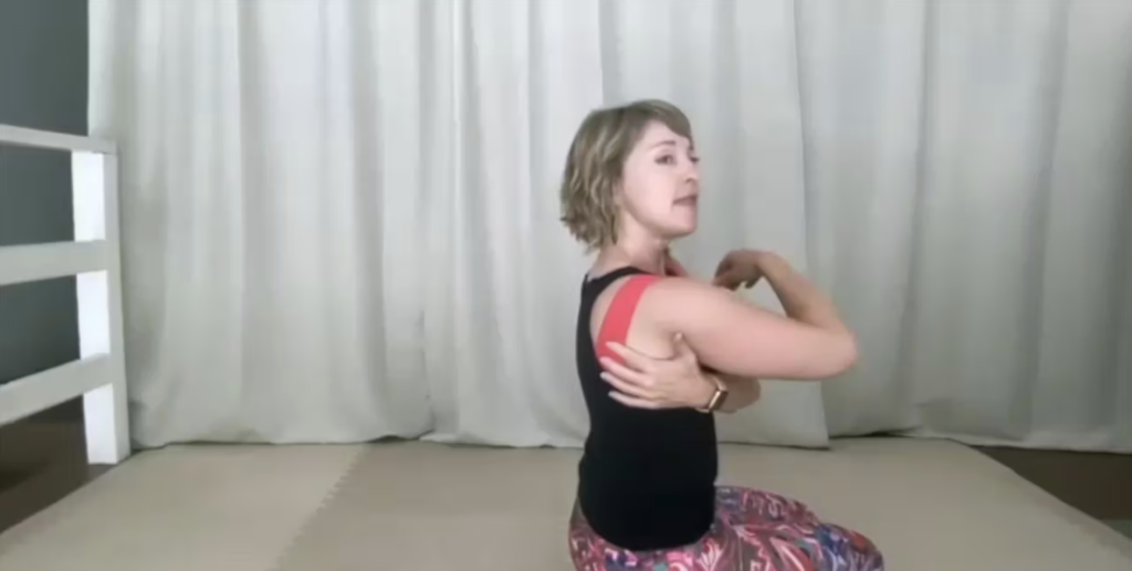 Woman doing Pilates exercises on the Pilates mat.