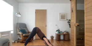 Woman doing yoga stretches.