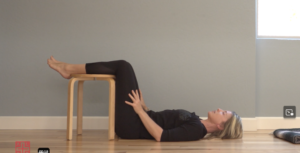 Woman teaching Pilates.