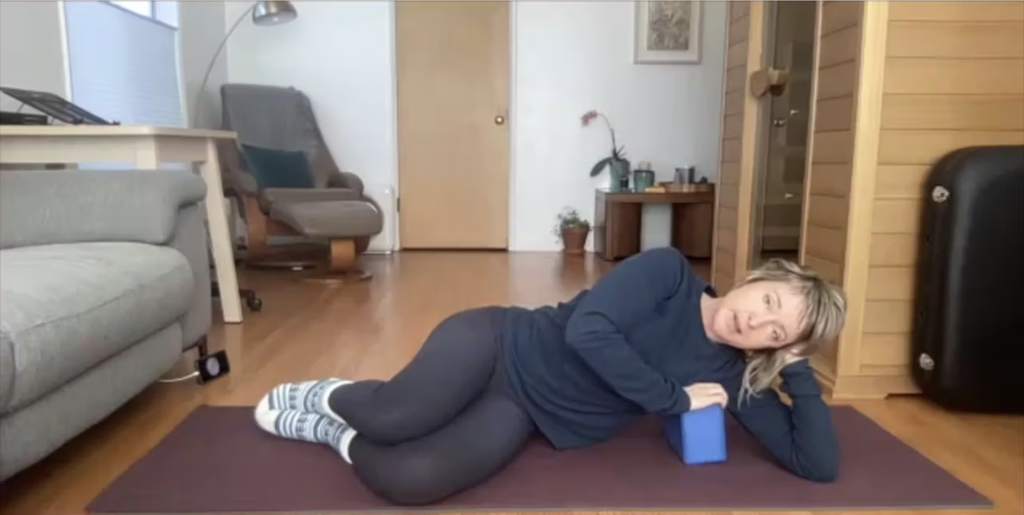 Woman doing Pilates exercises.