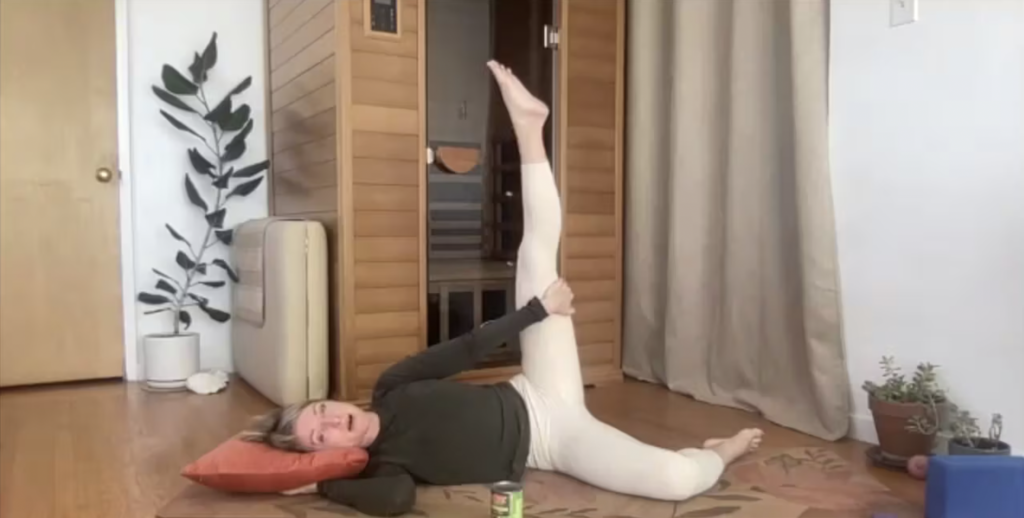 Woman doing Pilates exercises.