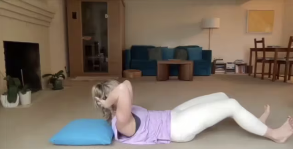 Woman doing Pilates exercises.