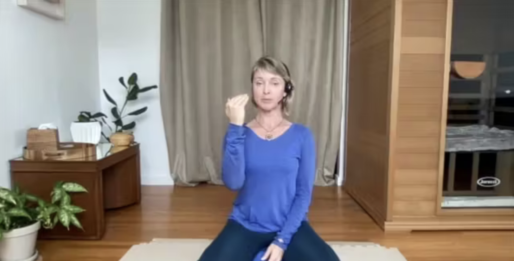 Woman doing Pilates exercises on the Pilates mat.