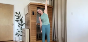 Woman doing Pilates exercises standing.