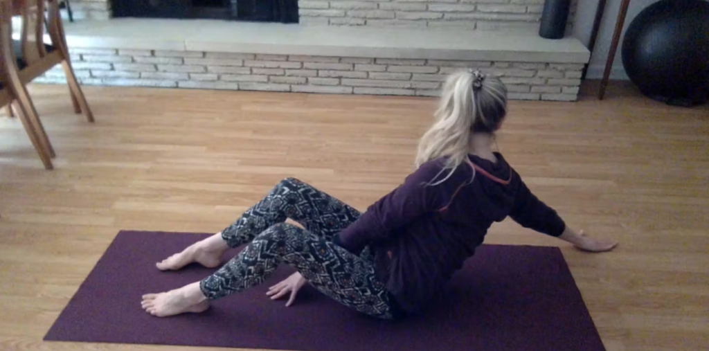 Woman doing Pilates exercises for the core.