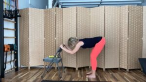 Woman doing barre exercise