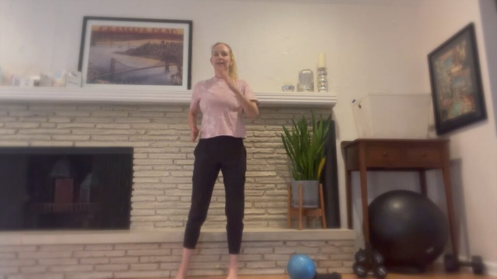 Woman doing Pilates standing