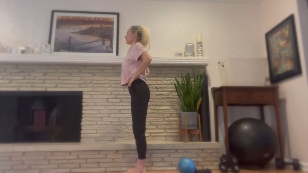 Woman practicing Pilates alignment