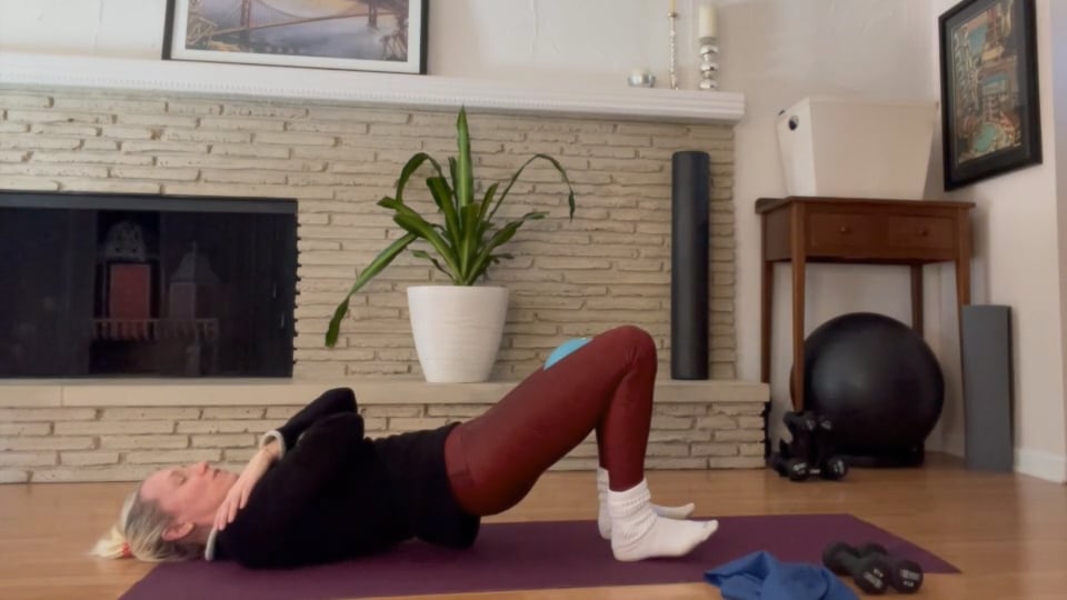 woman doing pilates bridge